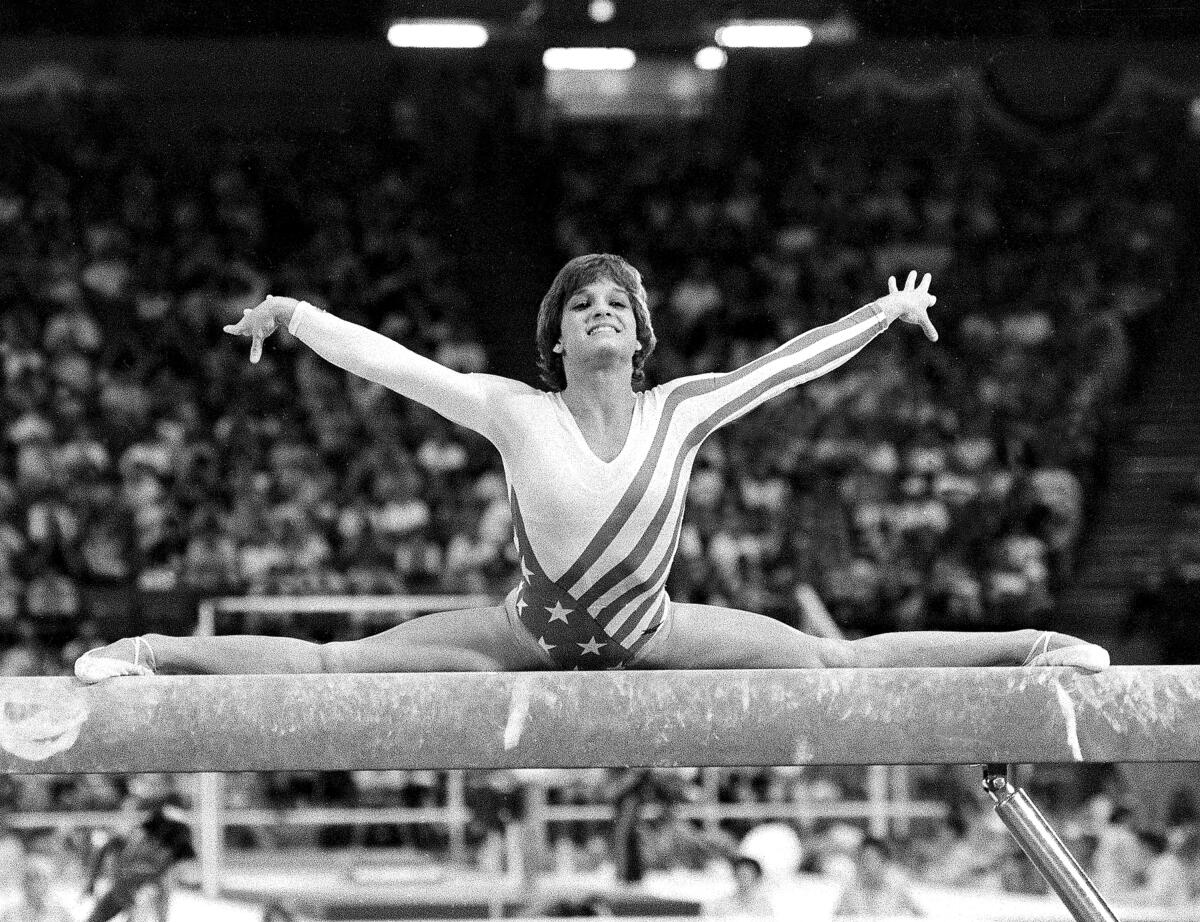 Mary Lou Retton performs on the balance beam during the 1984 Los Angeles Summer Olympics.