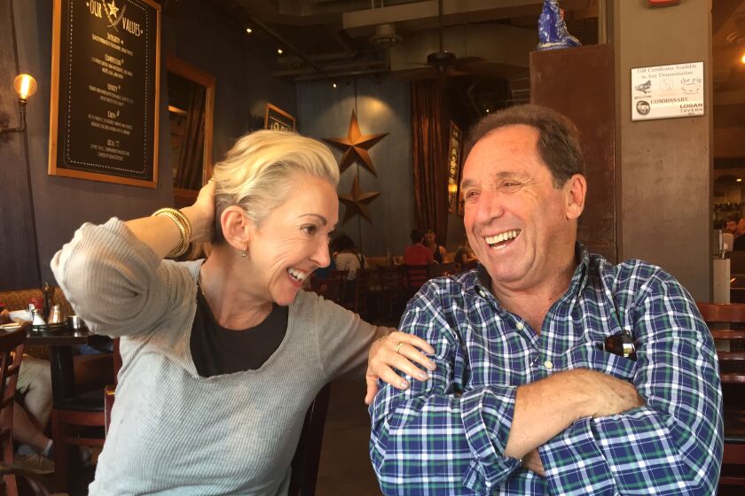 Jane, left, and Raymond Wurwand at a local restaurant. The owners of Dermalogica have committed $1 million in grant support to small businesses in Los Angeles struggling due to COVID-19.