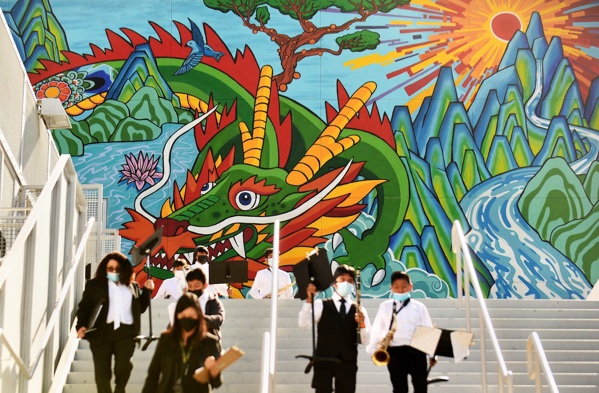 The unveiling of a mural at Young Oak Kim Academy in Koreatown.