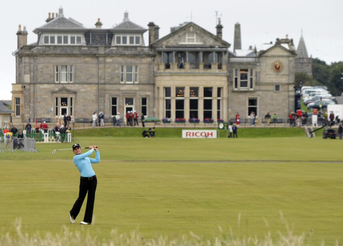 Lorena Ochoa plays a shot off the first fairway during the Women's British Open at the Old Course at the Royal and Ancient Golf Club in St. Andrews, Scotland. On Thursday, members of Royal and Ancient voted to admit women as members for the first time.