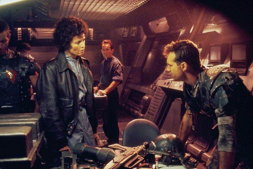 Actors Michael Biehn, Sigourney Weaver, Lance Henriksen and Bill Paxton, in a scene from the movie "Aliens," 1986.