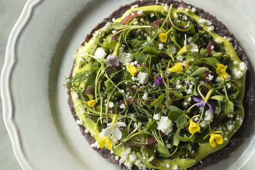 Grilled asparagus tostada at Broken Spanish in April 3, 2019. 