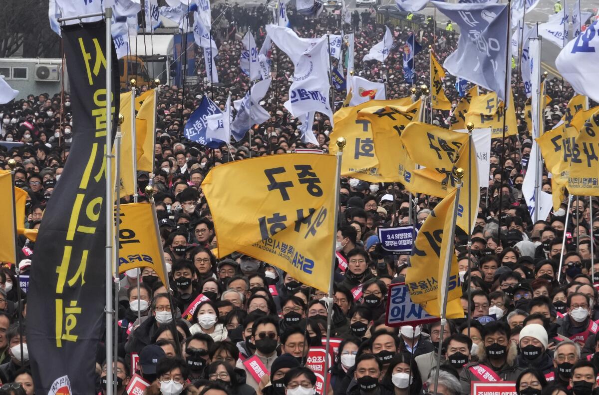 Doctors stage a rally against the government's medical policy in Seoul, South Korea.