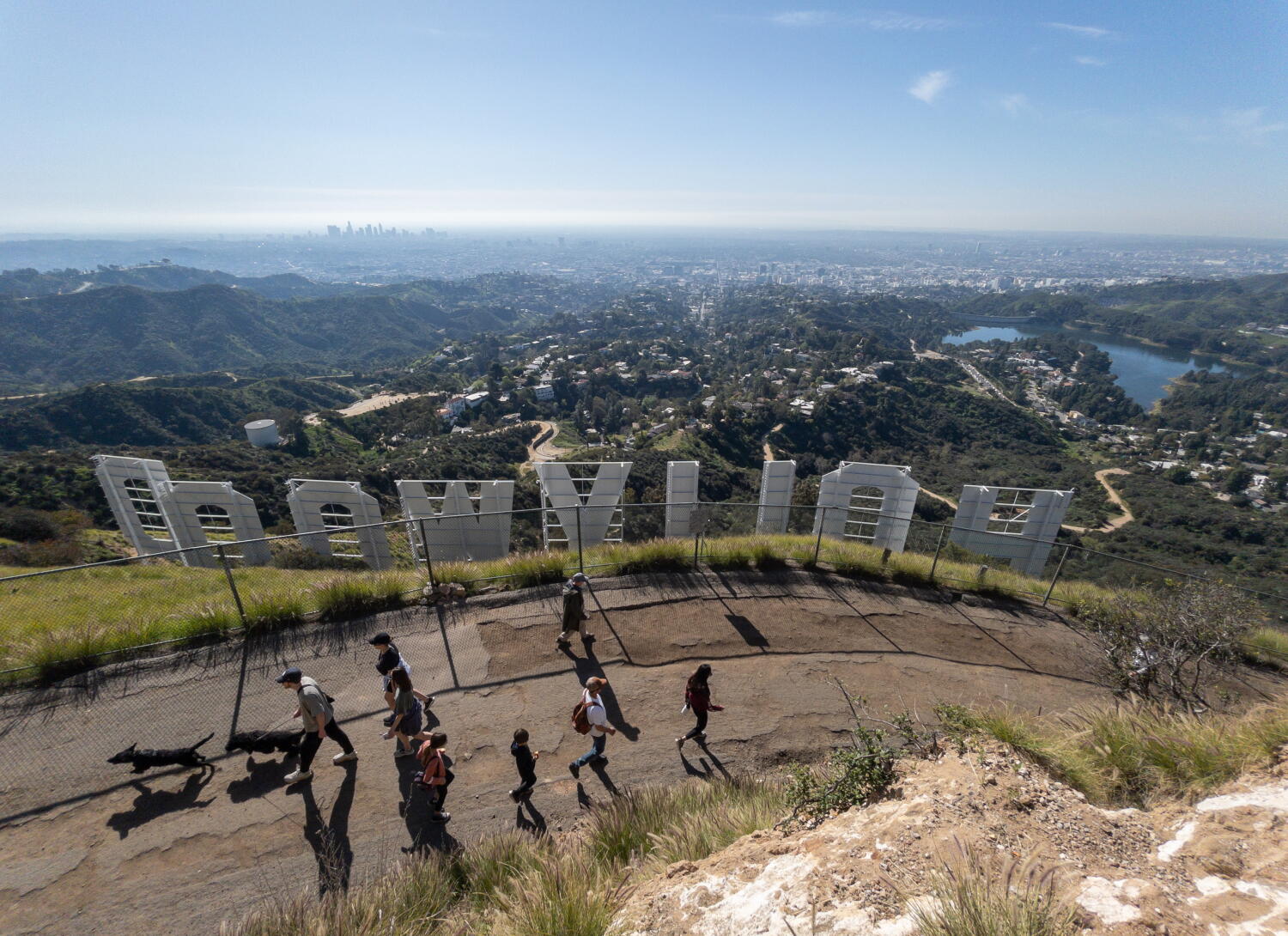 Living near Hollywood sign means cars, diapers, bottles of urine. Neighbors say they've had it