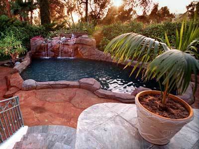 Twila Wolfe remodeled her backyard to include a waterfall . . .