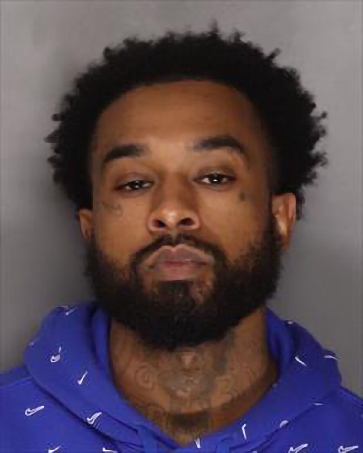 Mtula Payton, who is wanted on multiple felony warrants, including domestic violence and gun charges.