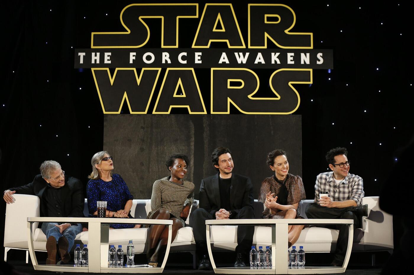 A press junket in L.A. for "Star Wars: The Force Awakens" features writer Lawrence Kasdan, from left, Carrie Fisher, Lupita Nyong'o, Adam Driver, Daisy Ridley and J.J. Abrams.