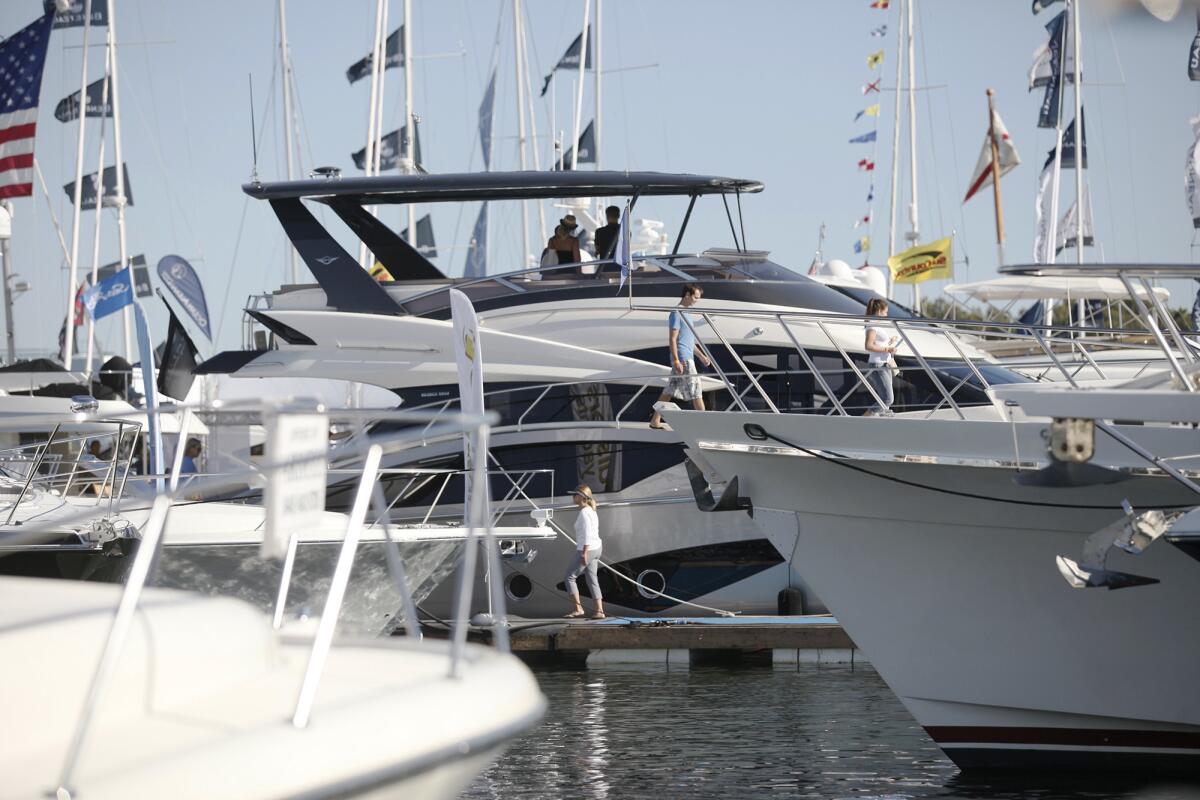 Spectators and vendors attend the 35th annual Newport Beach Lido Boat Show.