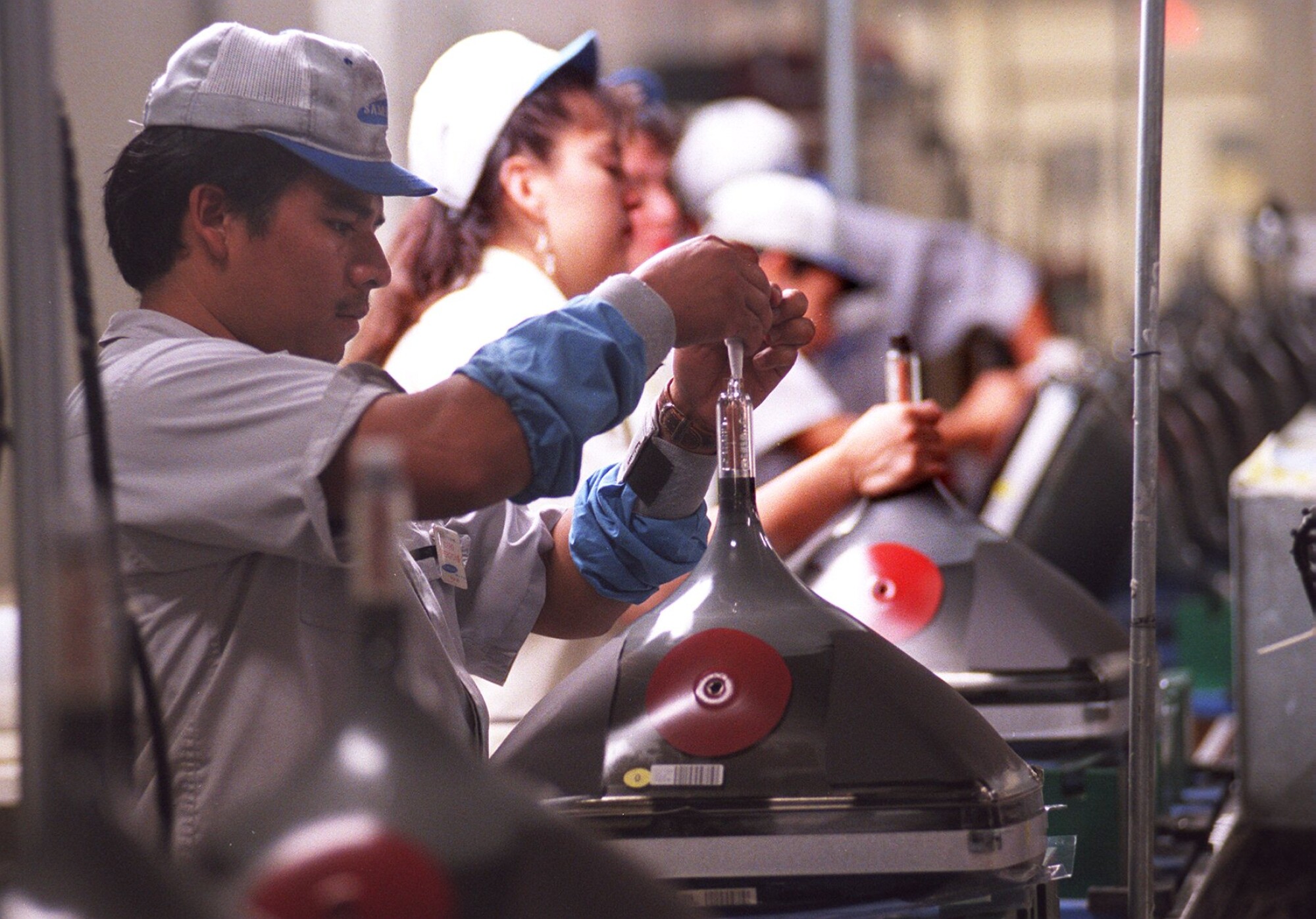 Workers on the assembly line at the Tijuana Samsung television tube manufacturing plant.