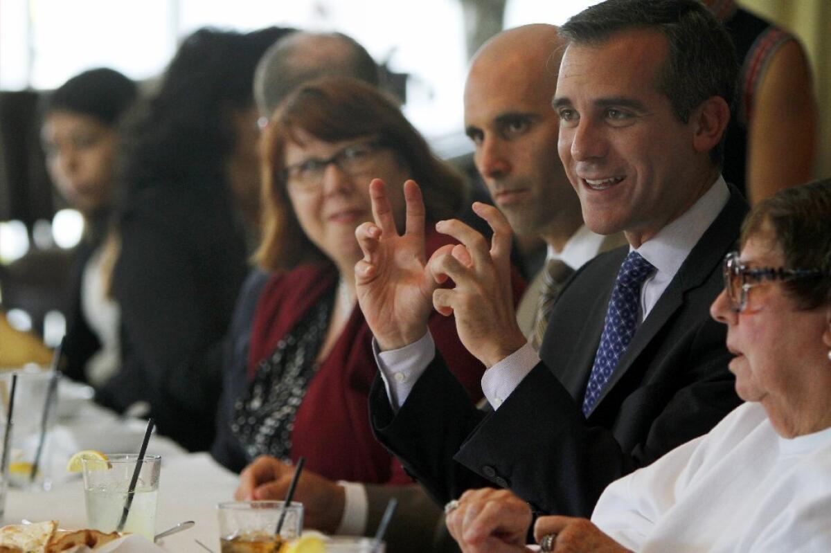 Los Angeles Mayor Eric Garcetti, shown at a private lunch last month, on Saturday rallied teachers gathered at a national convention in downtown Los Angeles.