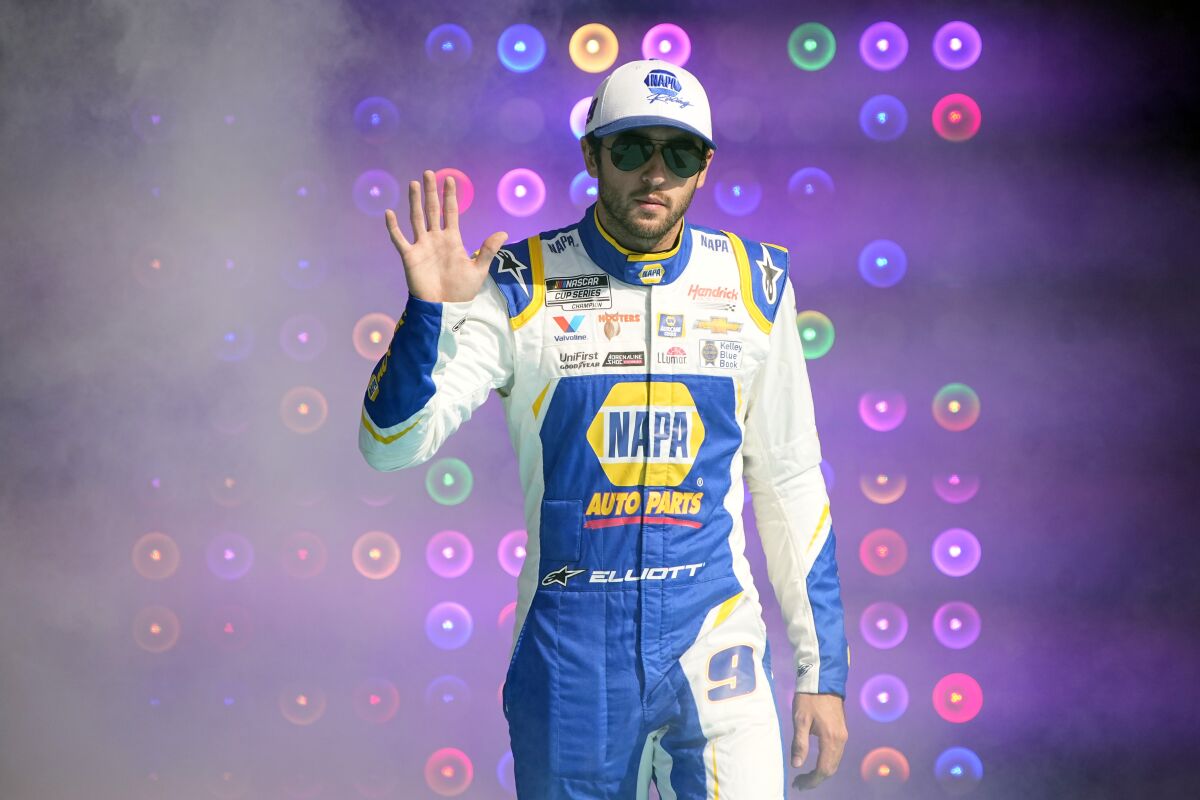 Chase Elliott is introduced to the fans before a NASCAR Cup Series auto race on Sunday, Nov. 7, 2021, in Avondale, Ariz. (AP Photo/Rick Scuteri)