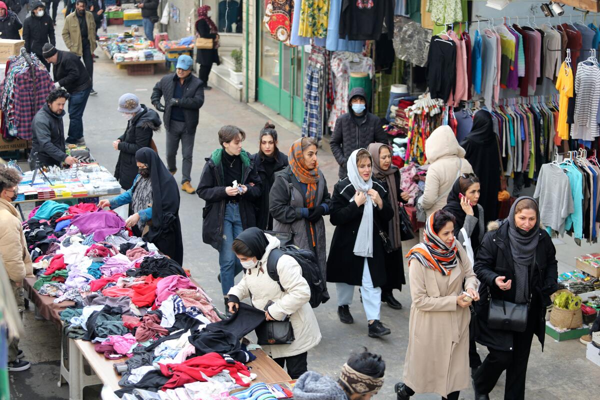 Shoppers in a bazaar in northern Tehran