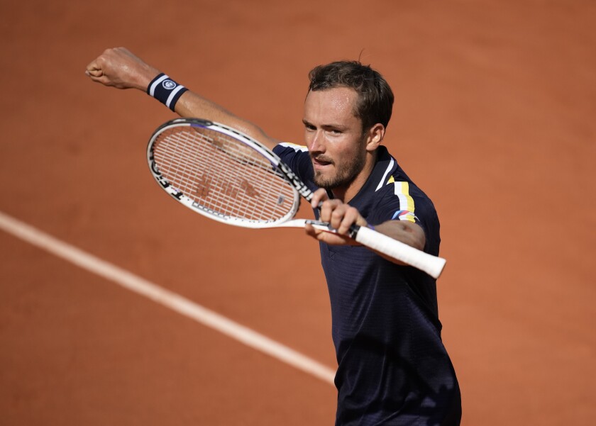 Russia's Daniil Medvedev celebrates after winning a point againstChile's Cristian Garin during their fourth round match on day 8, of the French Open tennis tournament at Roland Garros in Paris, France, Sunday, June 6, 2021. (AP Photo/Christophe Ena)