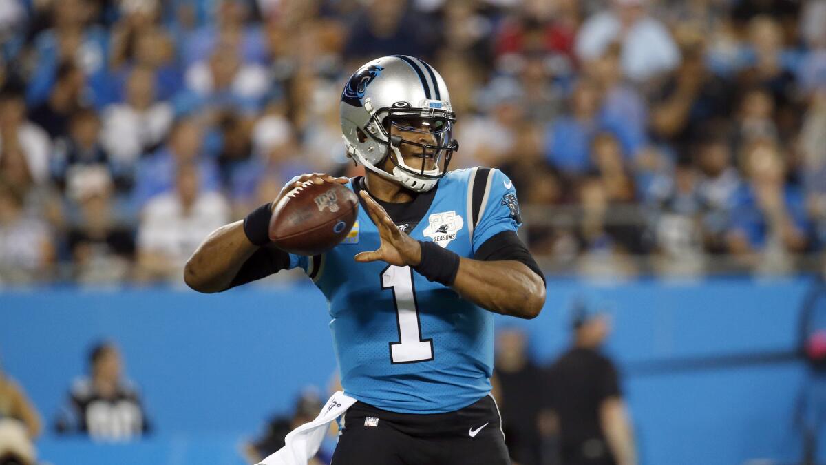 Panthers quarterback Cam Newton set up to pass against the Tampa Bay Buccaneers during a game on Sept. 12, 2019.