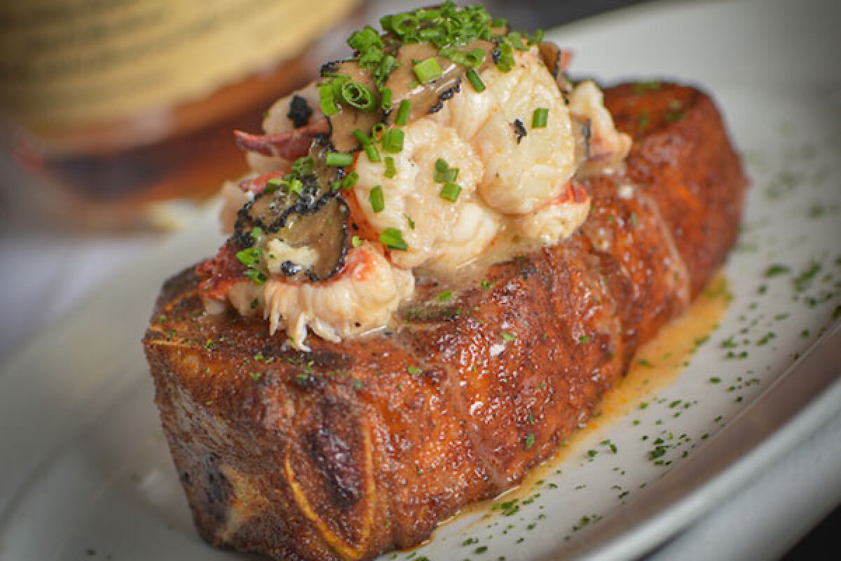 A lobster-topped New York strip steak at Steak 48, which will open a location in Del Mar in early 2023.