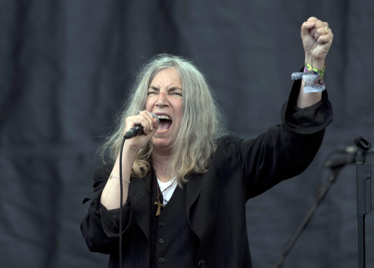 US singer-songwriter Patti Smith performs on The Pyramid Stage on the fifth day of Glastonbury Festival of Contemporary Performing Arts 2015, held at Worthy Farm, near Pilton, Somerset, Britain, 28 June 2015.