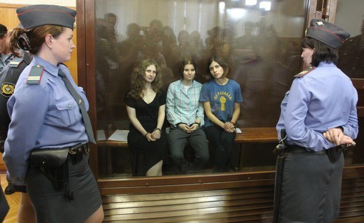 The members of Pussy Riot -- Maria Alyokhina, left, Nadezhda Tolokonnikova and Yekaterina Samutsevich -- in a Moscow courtroom after their sentencing.