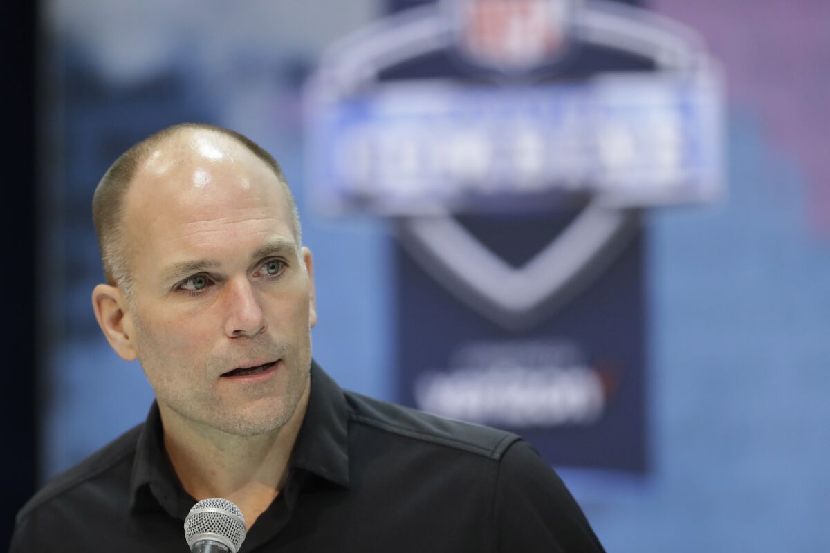 FILE - Baltimore Ravens general manager Eric DeCosta speaks during a press conference at the NFL football scouting combine, Wednesday, Feb. 27, 2019, in Indianapolis. The Ravens are working under Lamar Jackson’s timeline when it comes to a potential contract extension. Jackson’s contract status was at the forefront of news conference held by Baltimore general manager Eric DeCosta, Friday, Feb. 4, 2022. (AP Photo/Darron Cummings, File)