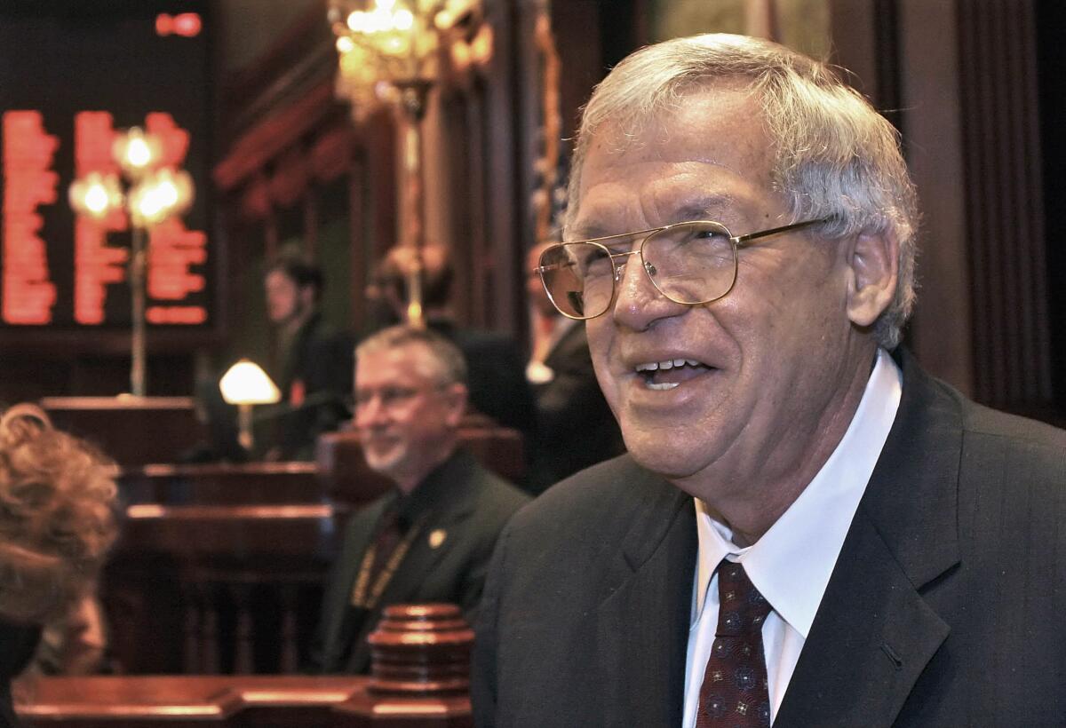 FILE - This March 5, 2008 file photo shows former U.S. House Speaker Dennis Hastert on the Illinois House of Representatives floor at the state capitol in Springfield, Ill. A man who sued Hastert for refusing to pay him $1.8 million in exchange for his silence about Hastert's sexual abuse of him decades ago will be named in court if the case goes to trial, a judge ruled on Thursday, Sept. 9, 2021. (AP Photo/Seth Perlman, File)