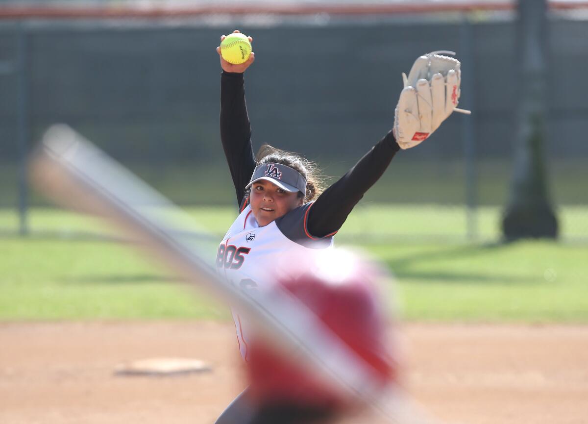 Los Amigos' Alyssa Ledezma winds up for a pitch during a game against Loara on March 26.