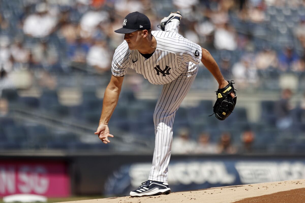 New York Yankees pitcher Jameson Taillon delivers to the Toronto Blue Jays during the first inning of a baseball game on Monday, Sept. 6, 2021, in New York. (AP Photo/Adam Hunger)
