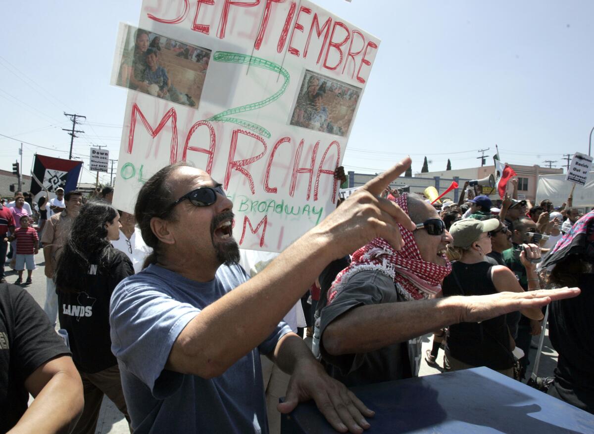 In 2006, immigrant-rights protesters square off with demonstrators opposing illegal immigration in Maywood after the town declared itself a sanctuary city.