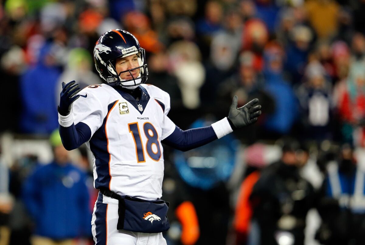 Denver quarterback Peyton Manning reacts during the Broncos' 34-31 overtime loss to the New England Patriots at Gillette Stadium in Foxborough, Mass.