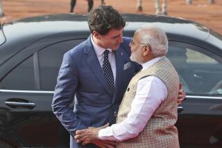 FILE- Indian Prime Minister Narendra Modi welcomes his Canadian counterpart Justin Trudeau for a ceremonial welcome in New Delhi, India, Friday, Feb. 23, 2018. India restored electronic visa services for Canadian nationals, an Indian foreign ministry official said Wednesday, Nov. 22, 2023, two months after Canada alleged India was involved in the assassination of a Sikh separatist in Canada. A diplomatic spat erupted between the two countries after Trudeau said in September that there were “credible allegations” of Indian involvement in the killing of Canadian citizen Hardeep Singh Nijjar in suburban Vancouver in western Canada. (AP Photo/Manish Swarup, File)