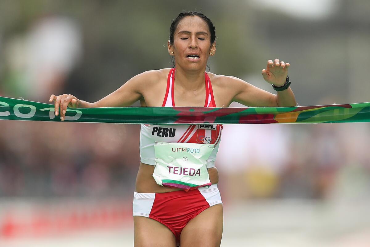 LIMA, PERU - JULY 27: Gladys Tejeda Pucuhuaran of Peru crosses the finish line during women's marathon on July 27, 2019 in Lima, Peru. (Photo by Patrick Smith/Getty Images) ** OUTS - ELSENT, FPG, CM - OUTS * NM, PH, VA if sourced by CT, LA or MoD **