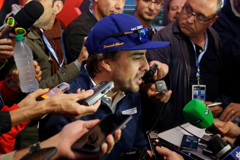 Fernando Alonso, of Spain, answers a question during a press conference for the Indianapolis 500 IndyCar auto race at Indianapolis Motor Speedway, Thursday, May 25, 2017 in Indianapolis. (AP Photo/Michael Conroy)
