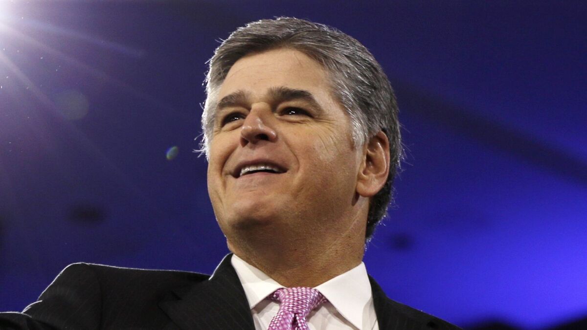 In this March 4, 2016, file photo, Sean Hannity of Fox News appears at the Conservative Political Action Conference (CPAC) in National Harbor, Md.