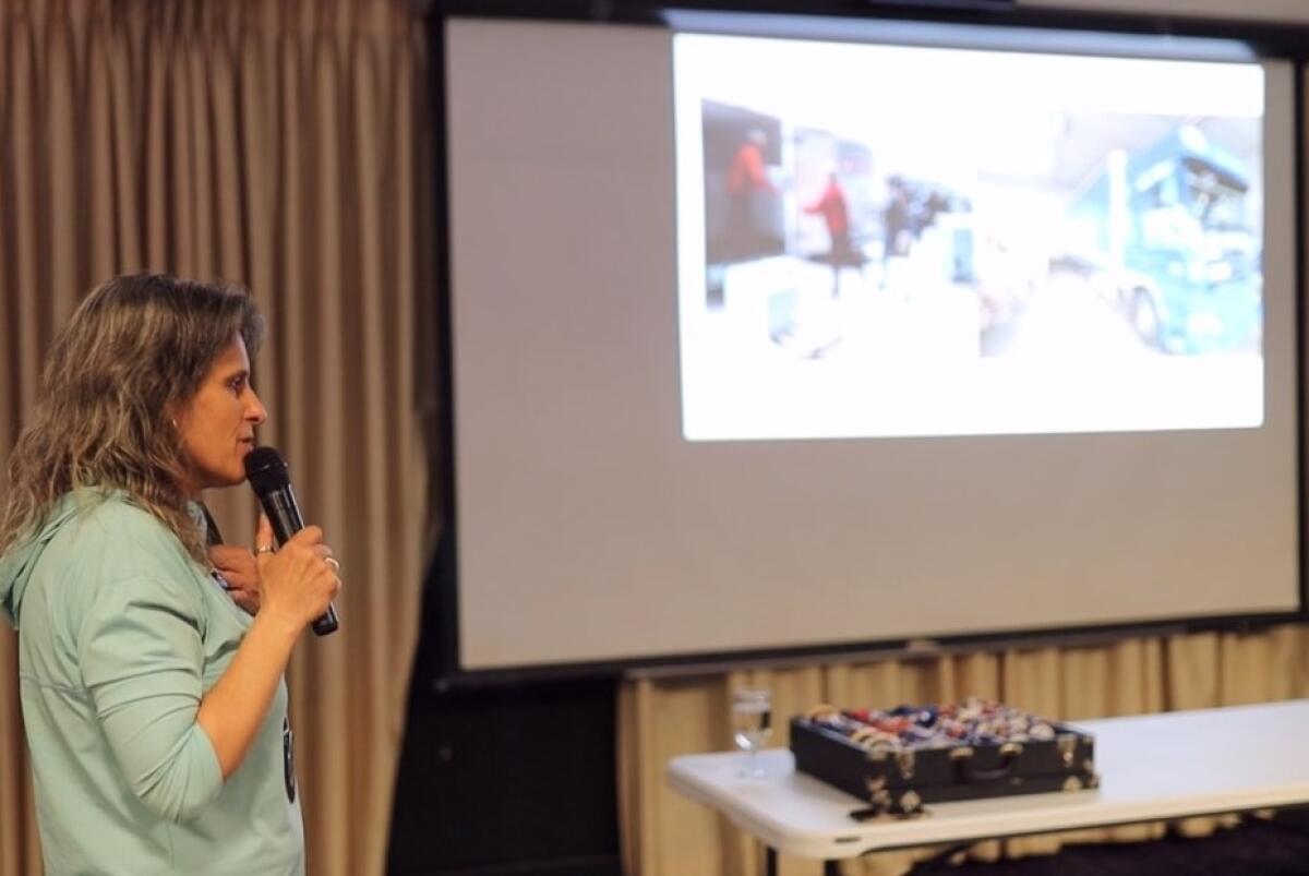 Daphne Fletcher gives a presentation on Ukraine at the Encinitas Rotary Club.