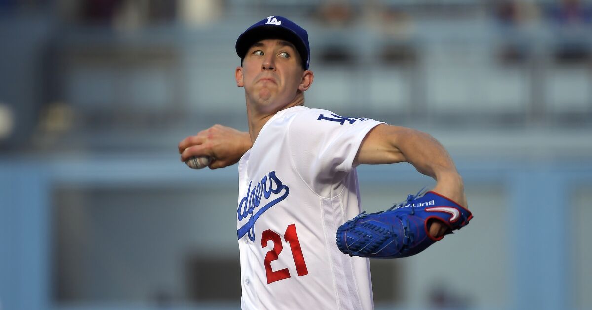 Dodgers starting pitcher Walker Buehler delivers against the Colorado Rockies on Sept. 2.