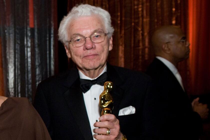 Honorary Award recipient Gordon Willis pose for a photo following the 2009 Governors Awards.