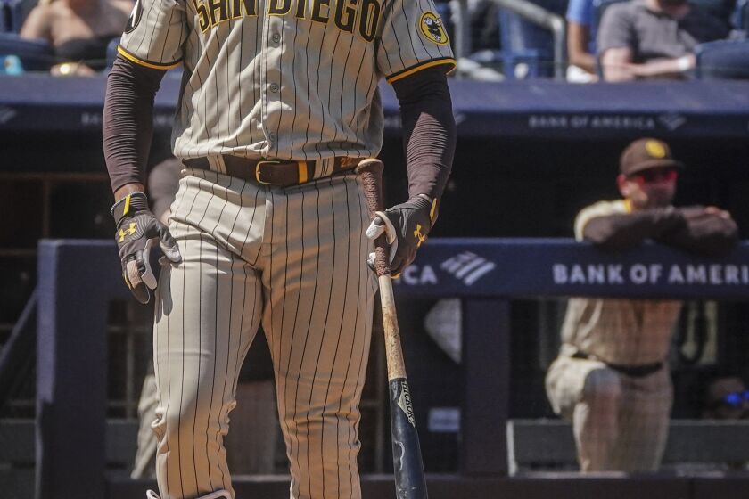 San Diego Padres batter Juan Soto looks toward the pitcher's mound after being walked during the eighth inning of a baseball game against New York Yankees, Saturday, May 27, 2023, in New York. (AP Photo/Bebeto Matthews)