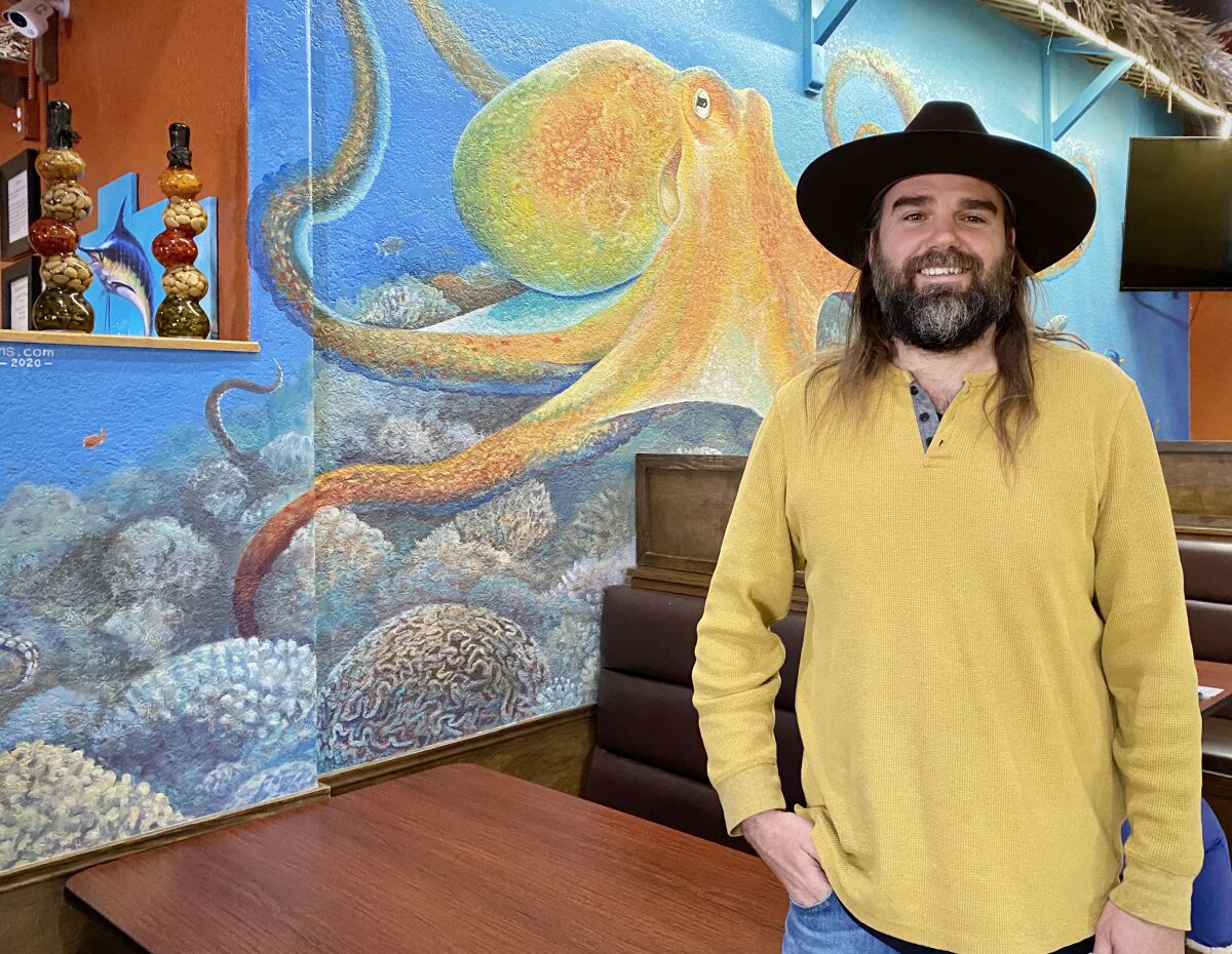 Ocean Beach resident Simon Melnyk has painted murals, including this one at Mariscos Mar de Cortez restaurant in Ramona.