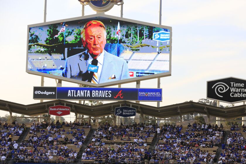 Vin Scully on screen at Dodger Stadium July 29, 2014 in Los Angeles. 