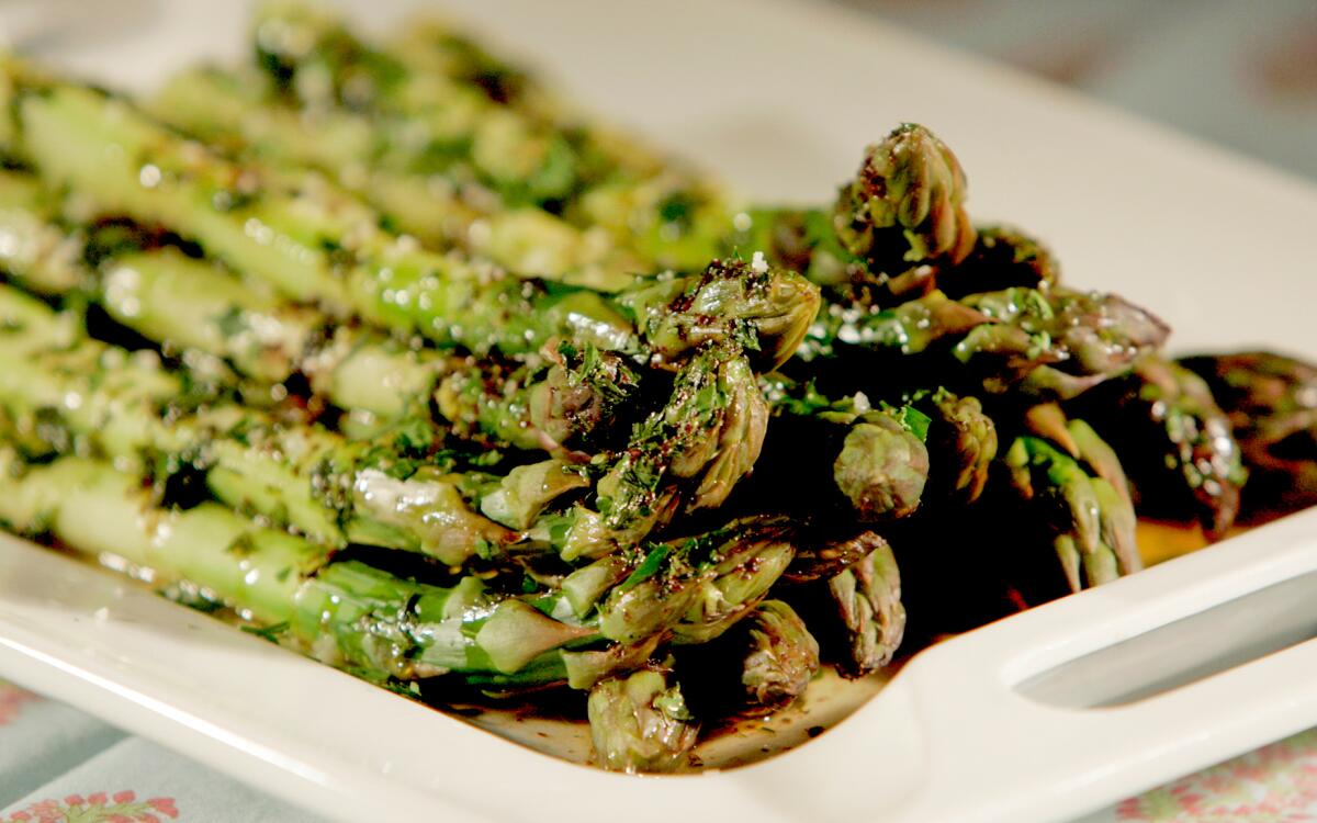 Steamed asparagus with brown butter sauce.