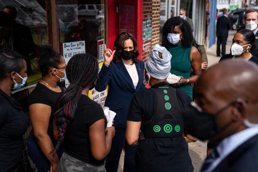 CHICAGO, IL - APRIL 06: Vice President Kamala Harris makes a stop at Brown Sugar Bakery on Chicago's Southside with Cook County State's Attorney Kim Foxx and Illinois Lt. Governor Juliana Stratton on Tuesday, April 6, 2021 in Chicago, IL. (Kent Nishimura / Los Angeles Times)