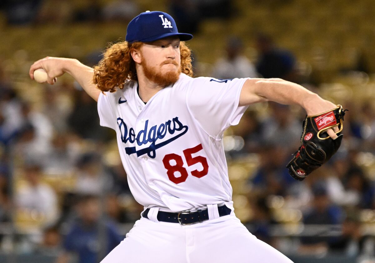 Dodgers pitcher Dustin May delivers against the Arizona Diamondbacks in September.