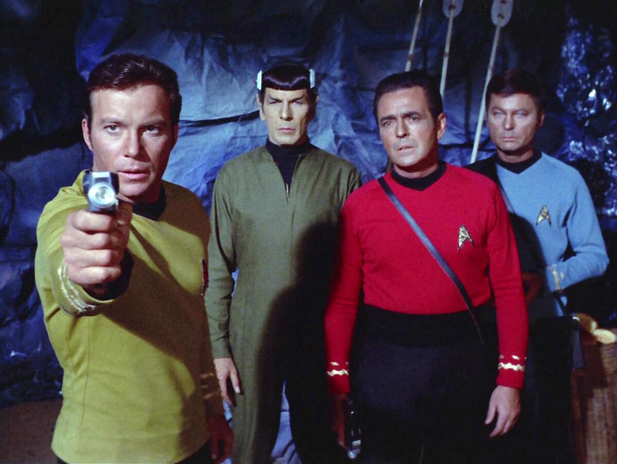 From left, William Shatner, Leonard Nimoy, James Doohan and DeForest Kelley in an episode of "Star Trek."
