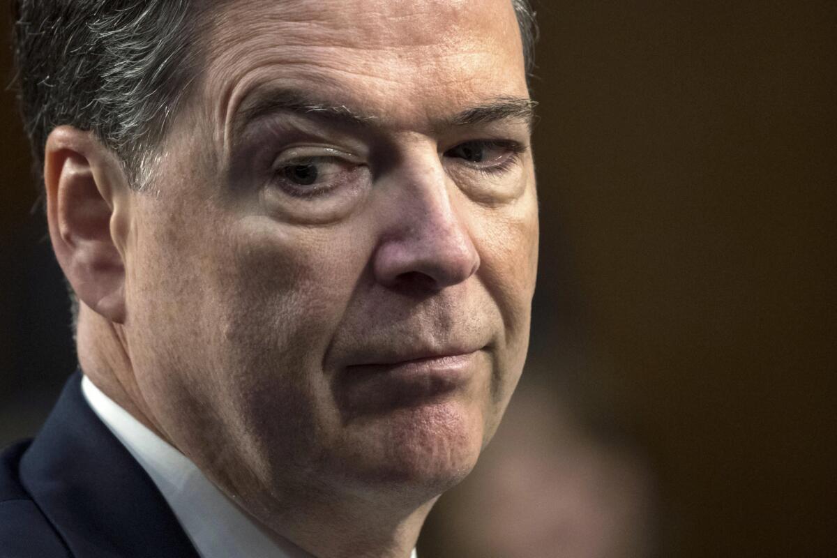 Former FBI Director James B. Comey testifies before the Senate Select Committee on Intelligence in Washington on June 8.