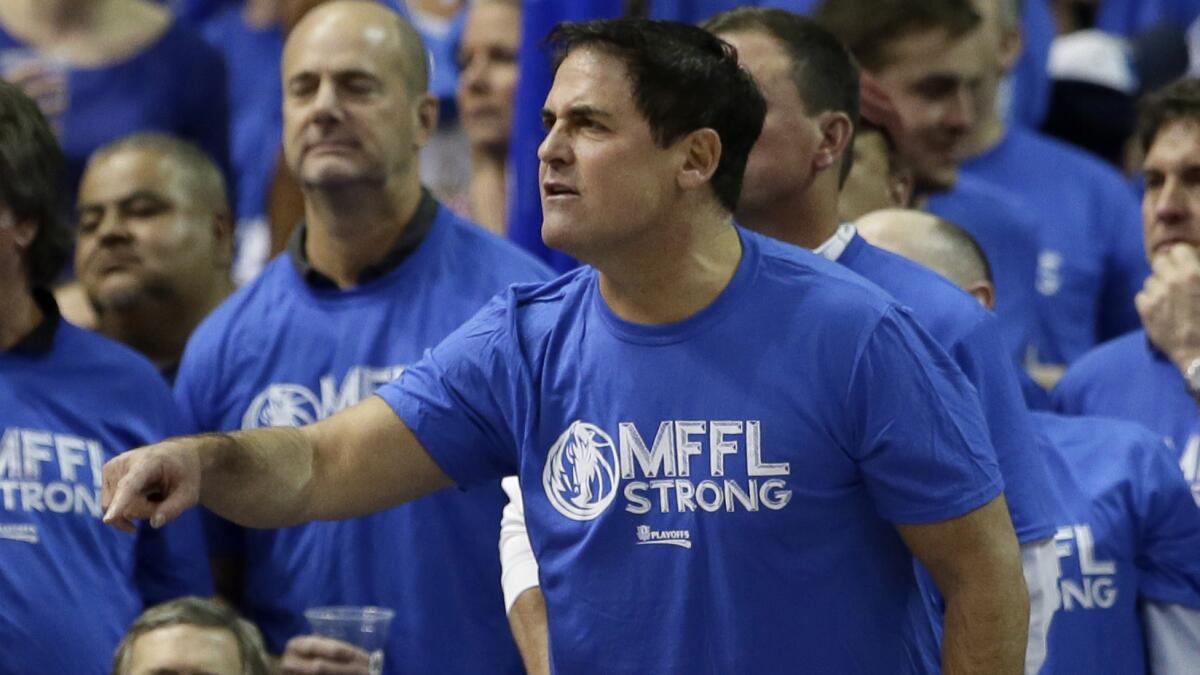 Dallas Mavericks owner Mark Cuban looks on during Game 6 of the NBA Western Conference quarterfinals against the San Antonio Spurs on Friday.