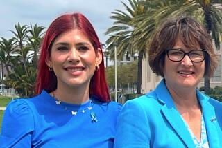 Guardian Scholar Dulce Pelayo (left) pictured with Promises2Kids CEO Tonya Torosian (right) at a recent press conference held in honor of National Child Abuse Prevention Month.