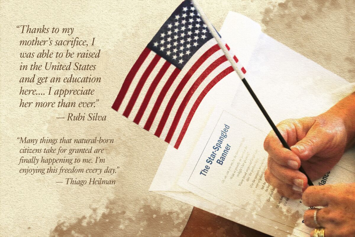 Hands holding a small American flag rest on a paper showing the words to "The Star Spangled Banner."