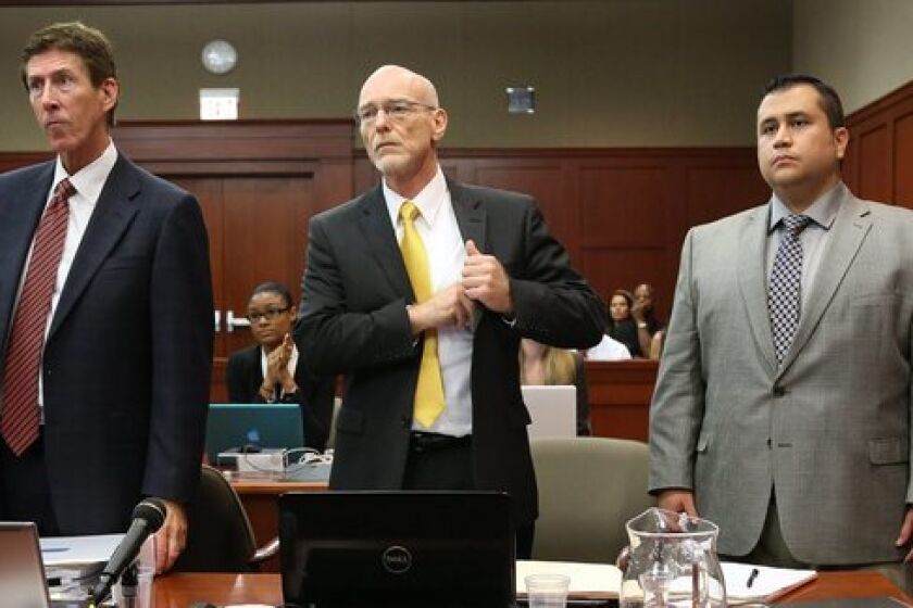 George Zimmerman, right, with attorneys Mark O'Mara, left, and Don West as the jury enters the courtroom in Sanford, Fla.