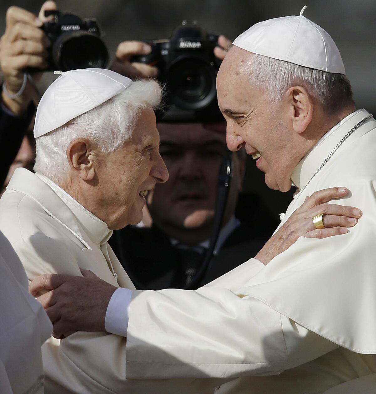 Pope Francis hugs Pope Emeritus Benedict XVI