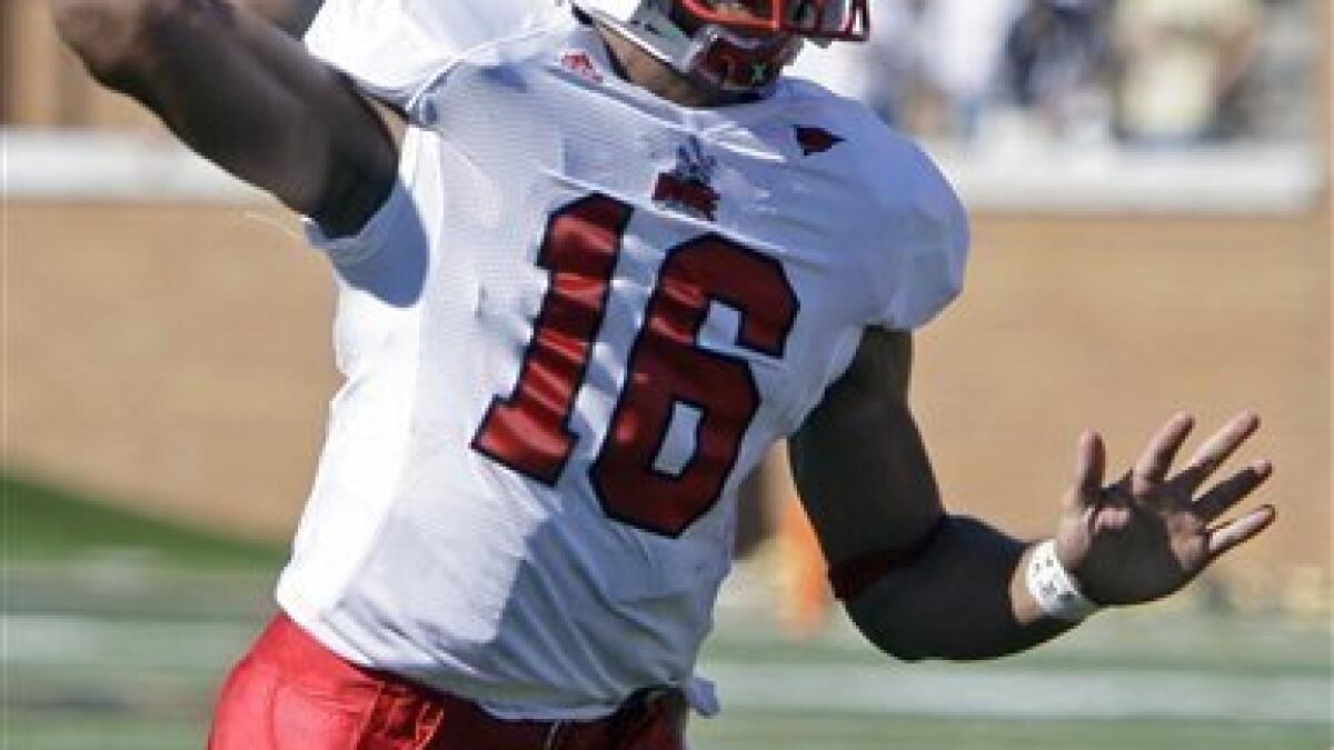 Sept. 16, 2010 - Raleigh, North Carolina, United States of America - NC  State quarterback Russell Wilson (#16) hands the ball off at Carter-Finley  Stadium in Raleigh, North Carolina (Credit Image: ©