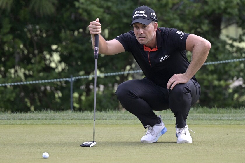 Henrik Stenson, of Sweden, lines up a putt on the sixth green during the final round of the Valspar Championship golf tournament, Sunday, May 2, 2021, in Palm Harbor, Fla. (AP Photo/Phelan M. Ebenhack)