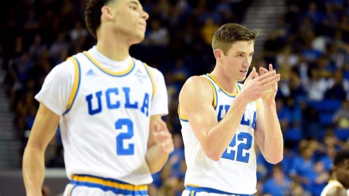 Freshmen Lonzo Ball, left, and T.J. Leaf react during the first half of UCLA's win over Pacific at Pauley Pavilion on Nov. 11.